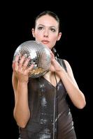 Portrait of young brunette with a mirror ball photo