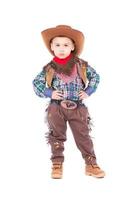 Little boy wearing cowboy suit photo