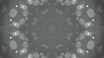 Looping wallpaper with a dark bokeh background and shimmering particles Background and overlay for the introduction video