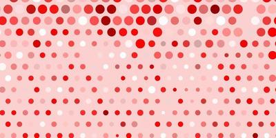 Light orange vector background with spots.