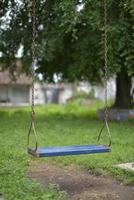 photo of an unused hanging swing