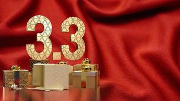 la caja de regalo 3.3 y dorada en seda roja para marketing o promoción de ventas representación 3d foto