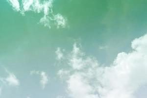 White cloud and blue sky background with copy space photo