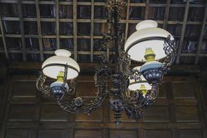 Photo of an old Javanese chandelier inside a joglo house