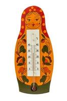 Thermometer isolated on white background. Matryoshka doll. photo