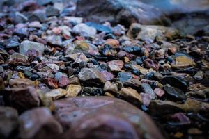 Beautiful colored mountain stones and water photo