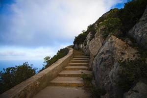 A mountain road made of stones photo