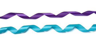 Twisted silk blue and purple ribbons for decoration on a white isolated background photo