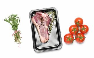 Raw New York beef steak is packed in a plastic container and vacuum sealed. Long-term storage striploin meat photo