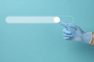 icon for searching and entering information and a hand in a blue medical glove. Virtual lane for loading photo