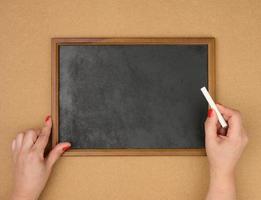 empty rectangular brown wooden frame on a brown background, copy space photo