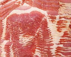 texture of sliced raw bacon, full frame, close up photo