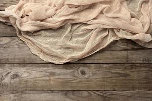 background from gray old pine boards and gauze kitchen towel photo