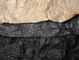 crumpled black and brown paper, abstract texture background photo