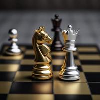 Gold and silver chess on chess board game for business metaphor leadership concept photo