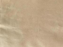 Close up old brown paper texture and background with copy space photo