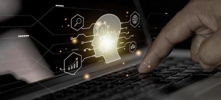 Businessman using light bulbs icon intelligence Ai. Chat bot with AI Artificial Intelligence, Futuristic technology, robot in online system. photo