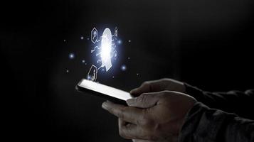 Businessman using light bulbs icon intelligence Ai. Chat bot with AI Artificial Intelligence, Futuristic technology, robot in online system. photo