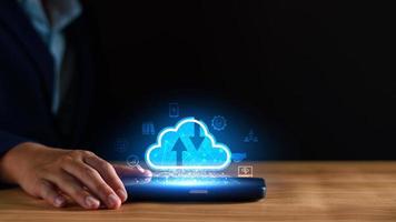 Businessman using cloud technology connect business data. Cloud computing concept idea show on hand. Internet Cloud technology. Digital Data storage. Network and internet service for business concept. photo