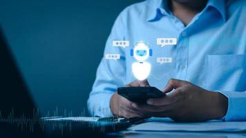 Chatbot Chat concept AI, Artificial Intelligence. businessman using technology smart robot AI, enter command prompt, contact for business information analysis, Futuristic technology transformation. photo