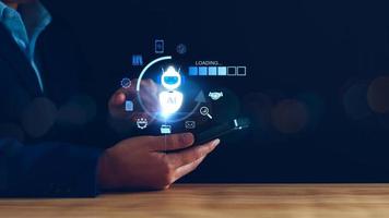 Chatbot Chat concept AI, Artificial Intelligence. businessman using technology smart robot AI, enter command prompt, contact for business information analysis, Futuristic technology transformation. photo
