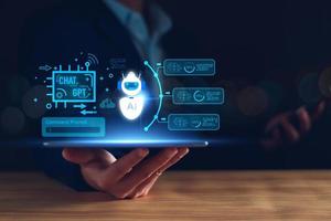 Chatbot Chat concept AI, Artificial Intelligence. businessman using technology smart robot AI, enter command prompt, contact for business information analysis, Futuristic technology transformation. photo