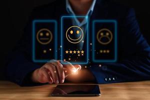 Customer service and Satisfaction ,business man giving Feedback satisfaction. Positive Review. Client Satisfaction Surveys, good, happy mood, smile, best product and service. Excellence guarantee. photo