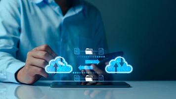 Businessman using cloud technology connect business data. Cloud computing concept idea show on hand. Internet Cloud technology. Digital Data storage. Network and internet service for business concept. photo