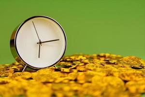 time and gold The idea of saving gold and valuable time. photo