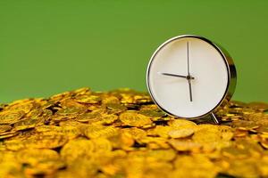 time and gold The idea of saving gold and valuable time. photo