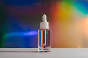 Face oil in rainbow photo