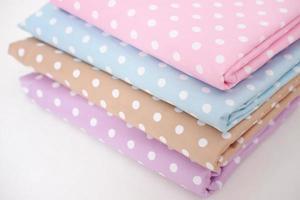 Beautiful folded pattern fabric as background photo