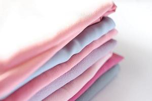 various beautiful and attractive fabrics folded neatly photo