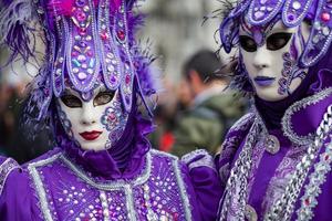 Venice, Italy - February, 2019 Carnival of Venice, typical Italian tradition and festivity with masks photo