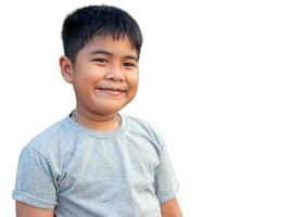 Portrait of smiling boy isolated on white background photo
