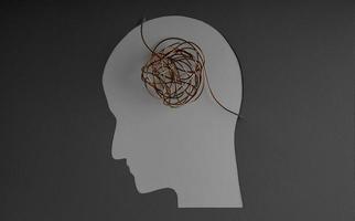 Mental Health Disorder Concept. Weak, Stressed Down Person. Negative Feeling. Depressed Emotional inside a Brain and Mind. Paper Cut as Human Head and Brain made by Messy Wire photo