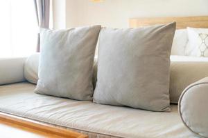 comfortable pillows on end of bed sofa photo