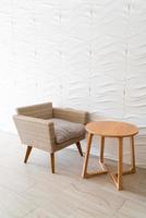 empty wicker sofa with table photo
