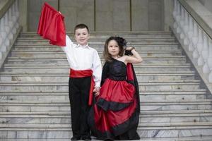 Belarus, city of Gomel, May 21, 2021 Children's holiday in the city. Boy and girl in national Spanish clothes. photo