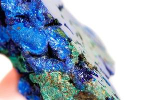 Macro mineral stone malachite with azurite on white background photo