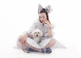 portrait of pretty girl dressed funny clothes and her little dog photo