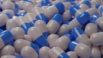 A group of antibiotic pill capsules is white and blue healthcare and medical, 3D illustration background. photo