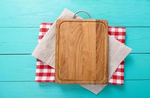 wooden table top view, desk for pizza with coloured napkins. Holiday, food concept photo