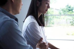 The woman felt depressed, upset and sad after fighting with her husband's bad behavior. Unhappy young wife bored with problems after marriage. photo