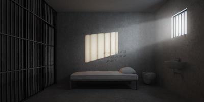 Prison cell with rays of light from the window.3d rendering photo