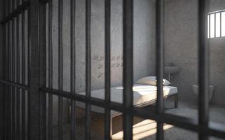 celda de prisión con luz de la ventana. representación 3d foto