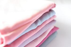 various beautiful and attractive fabrics folded neatly photo