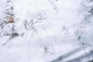 Crumpled white fabric texture, dirty white clothes background photo