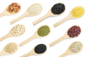 Collection set of beans and sesame on wooden spoons isolated on white background,top view photo