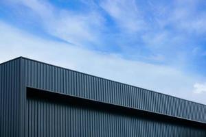 Metal sheet building modern with vivid sky photo
